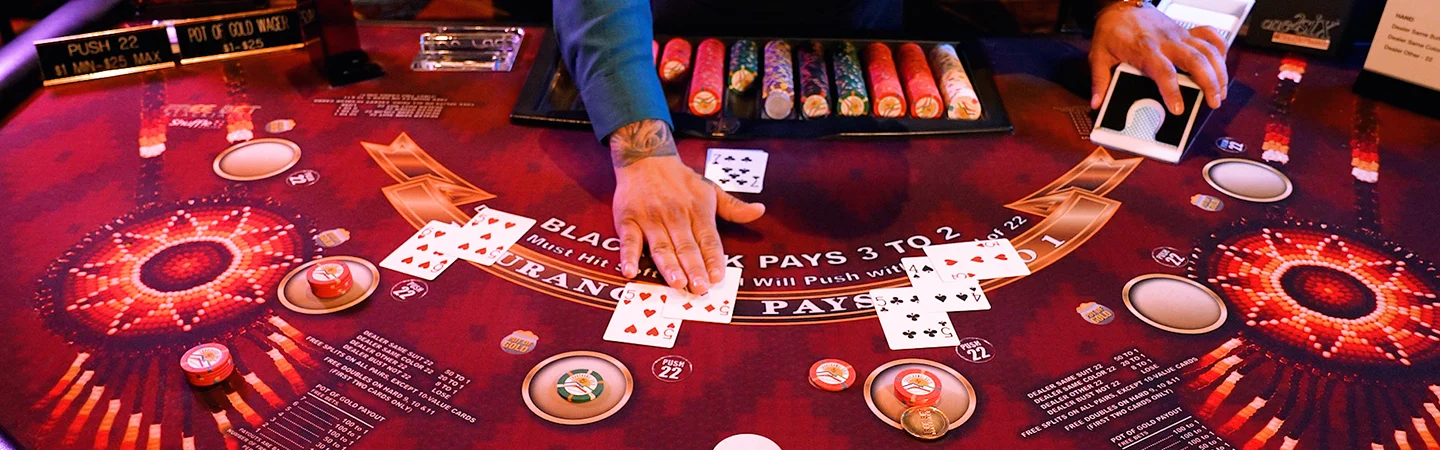 Casino blackjack table with cards and chips