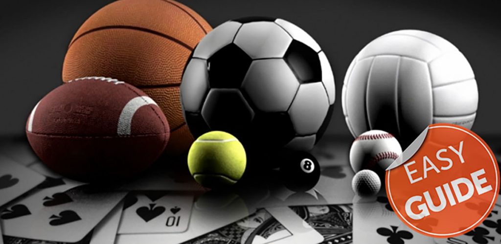 Assortment of sports balls with playing cards